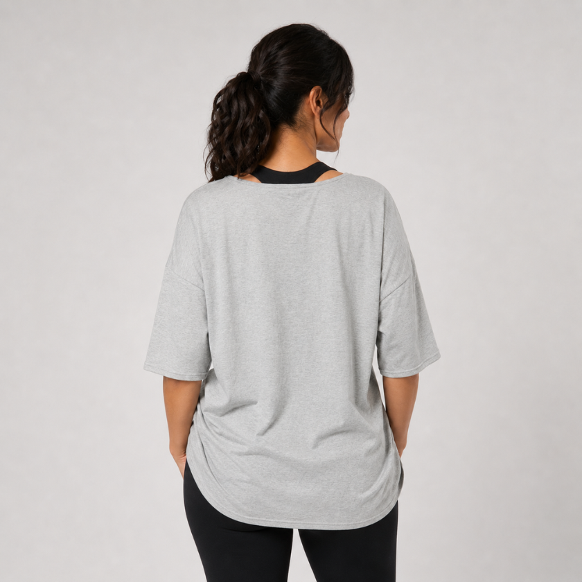 Back view of the Zen T-Shirt in grey marle with a relaxed shape and extra coverage

