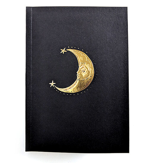 Front cover of the Moon Notebook with gold foil embossed crescent moon and stars on a black background.