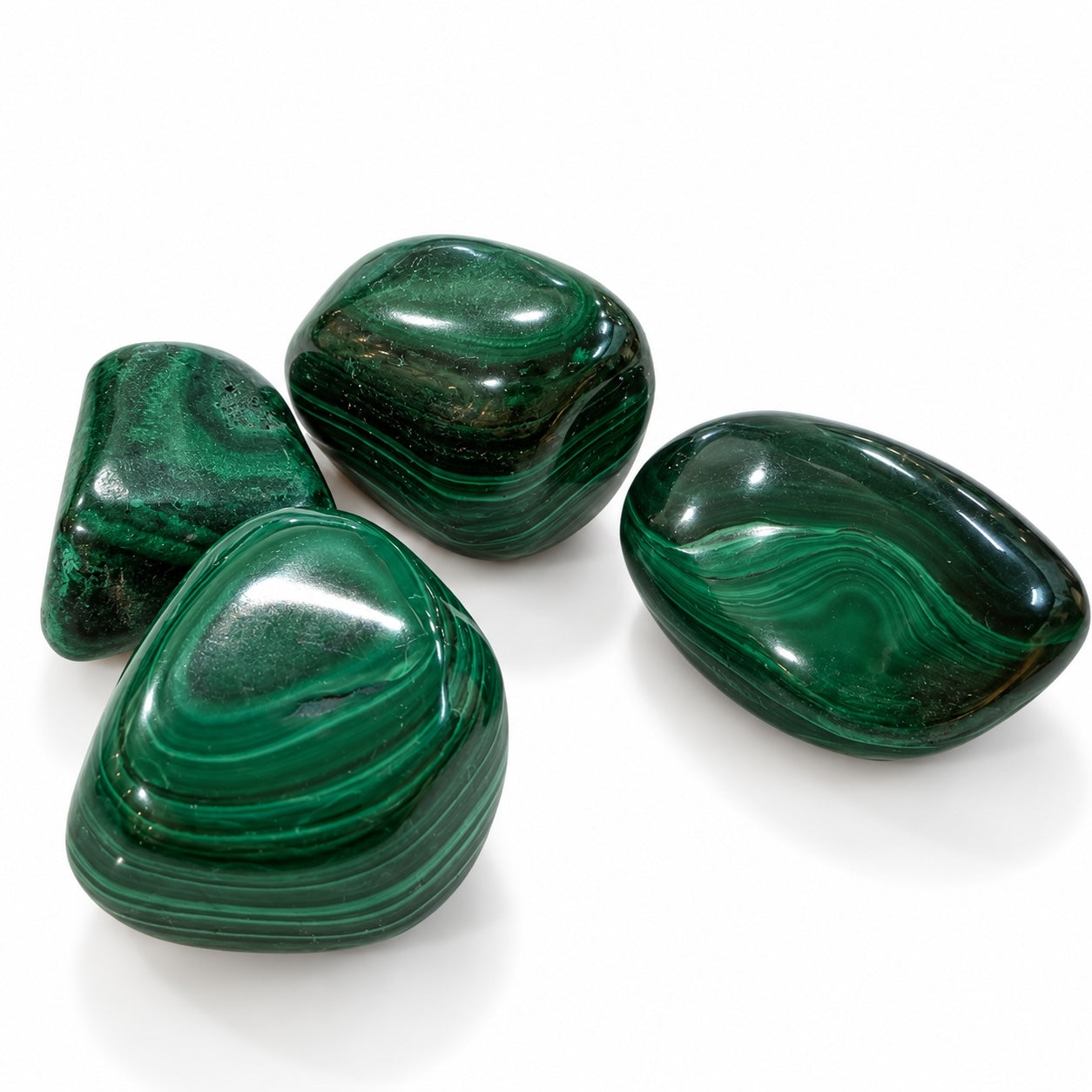 Malachite tumble stone with green natural patterns.