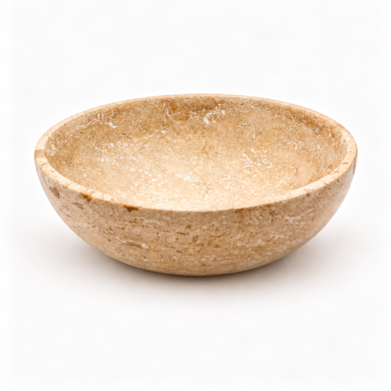 Natural beige travertine smudge bowl with a rounded shape, smooth rim and distinctive porous stone texture, photographed on a clean white background.