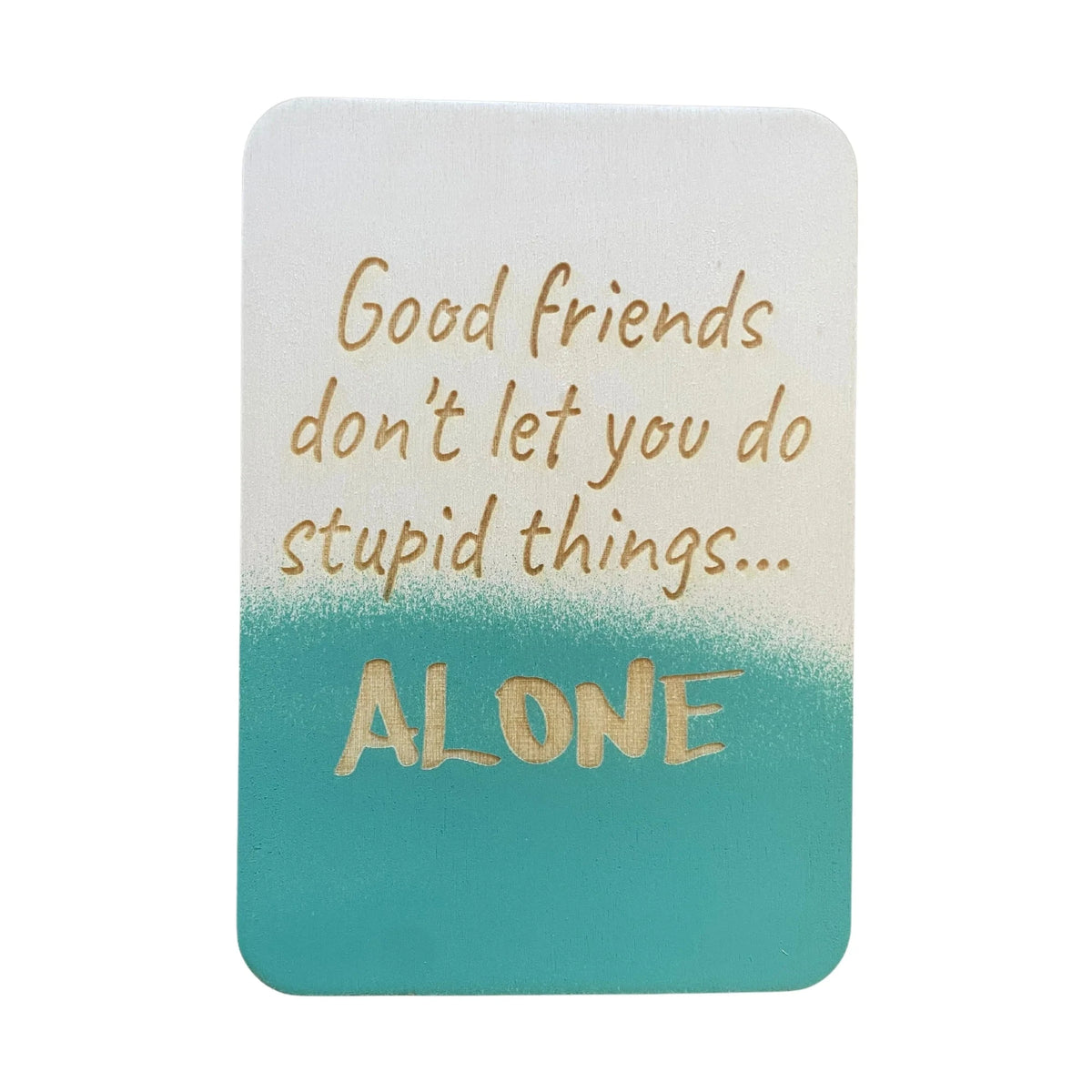 Wooden greeting card engraved with the phrase “Good Friends Don’t Let You Do Stupid Things Alone,” displayed with envelope and stand