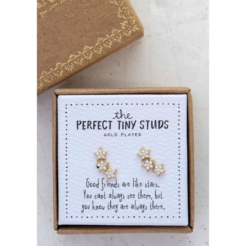 Gold-plated star stud earrings in gift box with friendship quote on white background