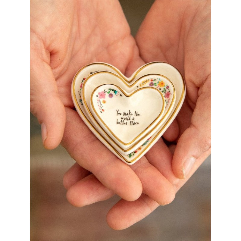  3 nesting heart-shaped trinket dishes.
