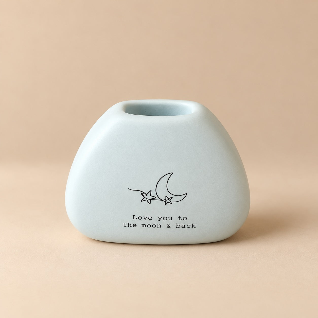 Soft blue rounded mini resin vase with black crescent moon and stars illustration and “Love you to the moon & back” lettering.