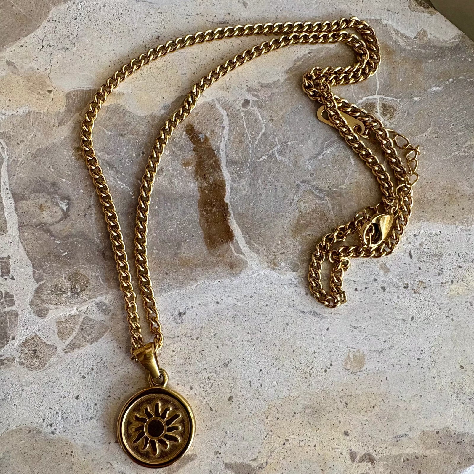 Solar Radiance Necklace with golden sun medallion design