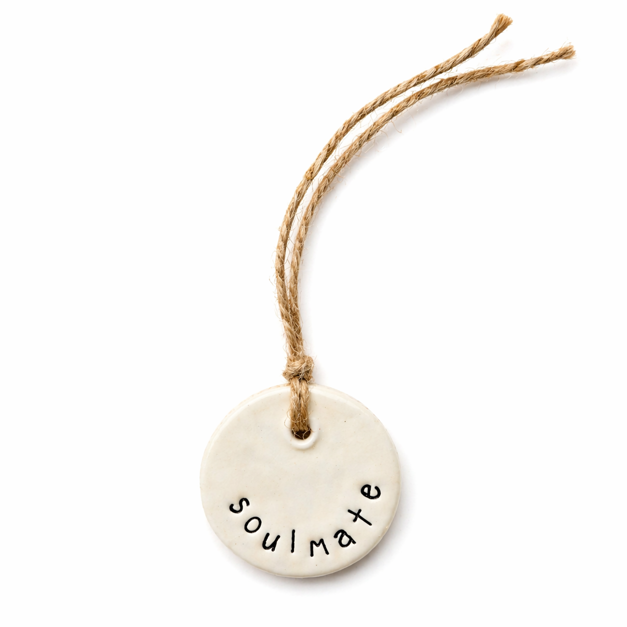 Handmade white round ceramic hanging tag with soulmate wording and natural jute twine