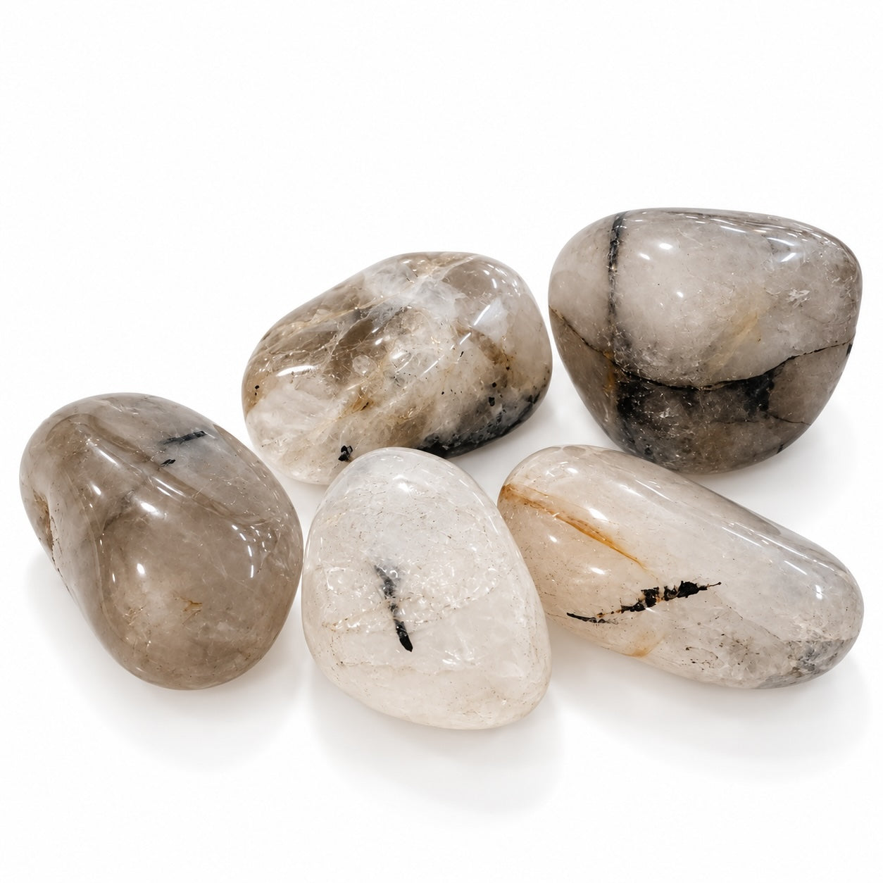 Tourmaline Quartz tumble stone with dark tourmaline inclusions in quartz.