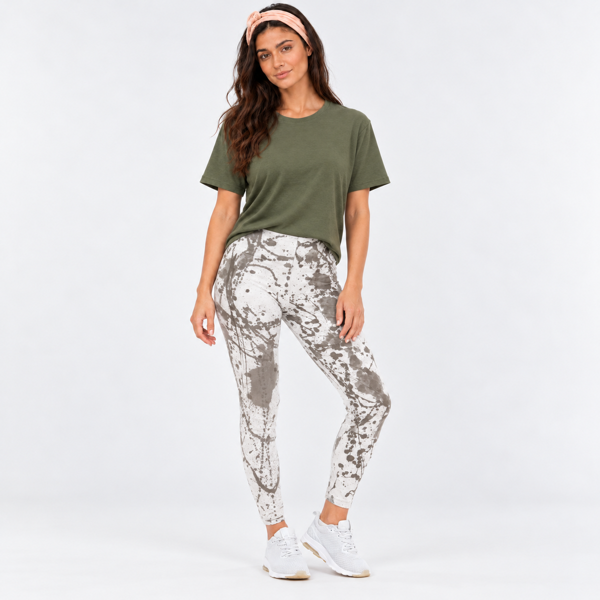 Woman wearing the Warrior Leggings in organic cotton with a natural plant dye splatter print, styled with the Luna T-Shirt in khaki by Luna &amp; Soul