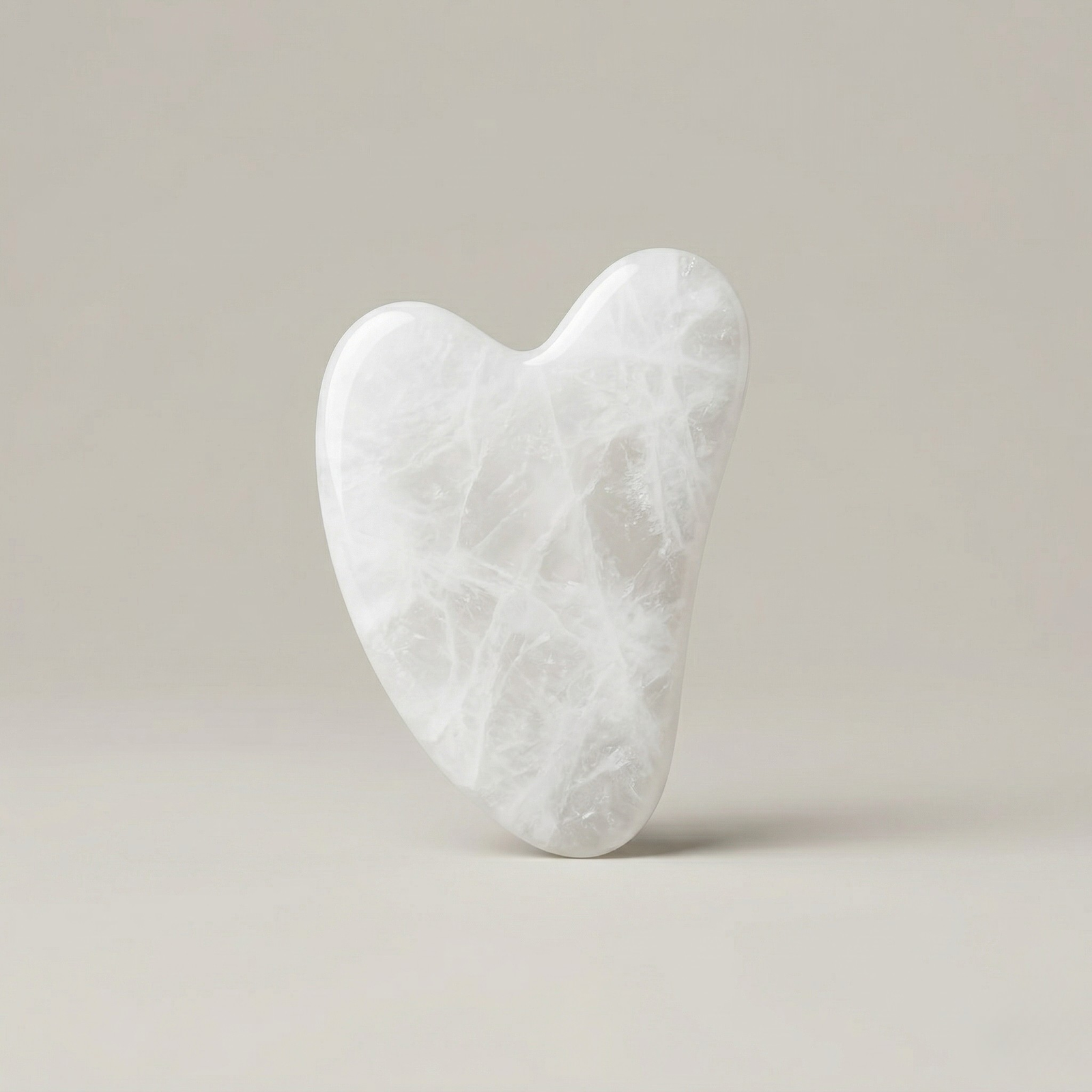 Natural white jade gua sha facial massage tool for skincare and lymphatic drainage